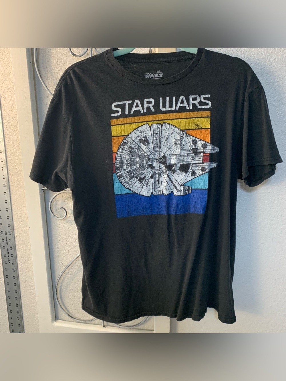 Star Wars Black Tee with Yellow, Orange and Blue Retro Falcon Graphic